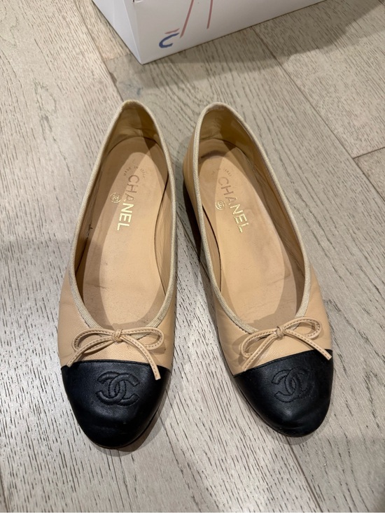 CHANEL Shoes - CHANEL Beige Leather Ballet Flats with Black Cap Toe